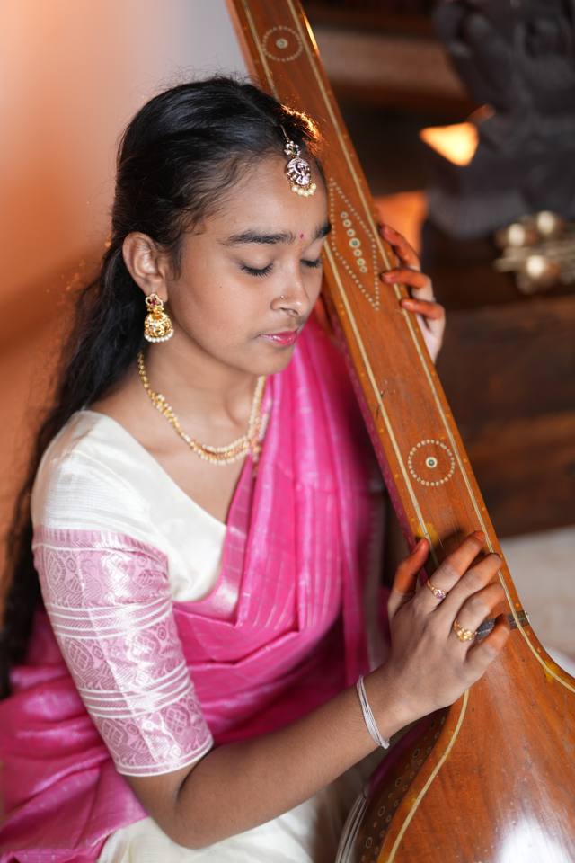 Amruthavarshini Kamarsu with a tambura
